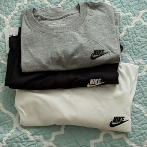 3 Nike shirts